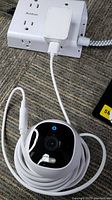Single Eufy camera connected to USB adapter on power strip