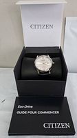 Citizen Eco-Drive watch in original black box, with Citizen branded manual.