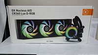 Box front view showing EK Nucleus AIO CR360 Lux D-RGB with image of the cooler and three RGB fans illuminated.