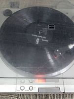Top view of the turntable with a record on the platter and the Sony logo visible on the dust cover.