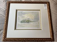 Full view of framed lithograph showing mat, ornate gold‐tone frame and glass