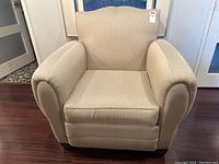 Front view showing overall design and cushion