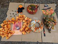 Full lot photo on cardboard showing all decorations spread out