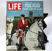 Front cover of Life magazine dated May 6, 1966 showing Jackie Kennedy dressed in riding outfit on a white horse in Spain.