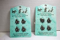 Two original cards of Classic Winnie-the-Pooh Button Collection by Danforth Pewterers Ltd., each with 4 hand-cast pewter buttons.