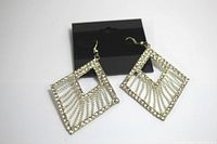 Two clear rhinestone diamond-shaped dangle earrings against white background showing geometric design and condition.