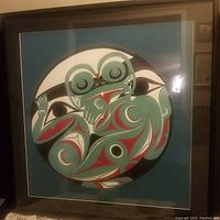 Full view of framed 'Moon of Change' silkscreen print by Floyd Joseph showing the circular Indigenous-inspired design in stylized colors.