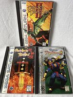 Front covers of Panzer Dragoon II Zwei, Battle Arena Toshinden Remix, Virtua Fighter 2