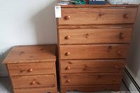 Dresser and nightstand side-by-side showing overall condition and wood-tone finish