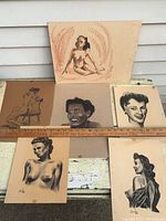 Set of six Conte drawings laid out showing seated nude, nude back view, portraits and torso studies