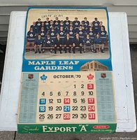 Photo showing October 1970 calendar page with Toronto Maple Leafs team photo and Maple Leaf Gardens building graphic. Export 'A' Filter cigarette tab visible.