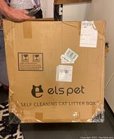 Sealed shipping carton with branding and product name Els-pet self cleaning cat litter box.