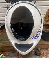 Front view showing spherical entry and control panel