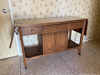 Front view of buffet with leaves down