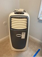 Front view of the SoleusAir portable air conditioner showing front vent, control panel, and brand label.