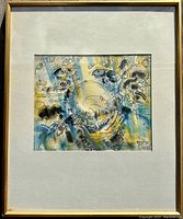 Full view of framed artwork showing white mat and gold wood frame