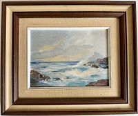 Framed full view showing the painting with ocean waves, rocks, sky and seabirds.