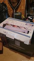 Buffet server in original box showing product image and branding.