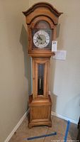 Full view of Ridgeway wooden grandmother clock showing overall condition and details.