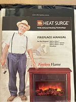 Instruction manual featuring an older man standing next to a fireplace insert showing the flame effect.