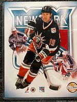 Front view of the plaque showing Wayne Gretzky in New York Rangers uniform and smaller images along with the limited edition badge 1552/5000.