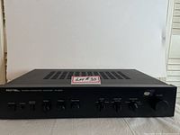 Front full view of the Rotel RA-820A stereo integrated amplifier showing its control panel and the overall shape in black metal casing.