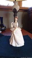 Front view of Royal Doulton Patricia figurine showing full gown and posture.