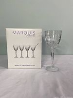 Box showing Marquis by Waterford branding and image of four wine glasses