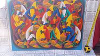 Front view of Fritz Charles signed abstract painting 'The Market', showing colorful geometric figures and fruits in baskets.