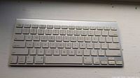 Top view of Apple Wireless Keyboard Model 1314 showing overall layout and key condition.