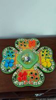 Vintage 1975 Giant Pop-o-matic Lucky Break game board in shamrock shape with colorful playing pieces and central pop-o-matic dice roller with black cat figure inside.