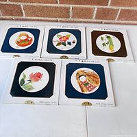 Lot of 5 vintage Japanese Washi paper art kits in original packaging showing different designs and white square frames with round windows.