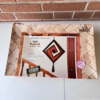 Box showing vintage Phentex wall hanging kit with design image and branding.