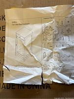 Assembly instructions and exploded view diagram for the GiftGo Cat Litter Box Enclosure showing parts and assembly steps.