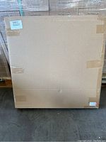 Sealed cardboard packaging containing the photo light box set showing size and condition.