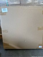 Cardboard box packaging of the photo light box, showing no signs of opening or damage.