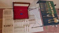 Full layout showing canteen, Community flatware, pickle forks, Prelude teaspoons, Towle fork
