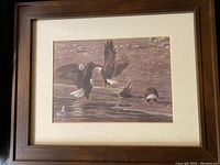 Front view of framed lithograph showing artwork and frame