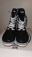 Pair of black Ripzone men's winter boots size 10 with white laces, shown front view standing on box.
