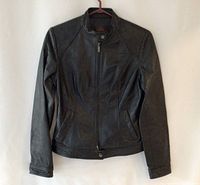 Front view of black Danier women's leather jacket showing full length and design.