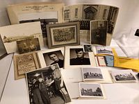 Full view of the lot showing various vintage black-and-white military photos and the 1946 Victory Celebrations program.