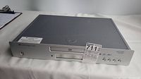 Front view of Cambridge Azur 540D DVD player showing disc tray, control buttons, and power LED.