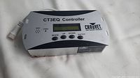 Chauvet CT3EQ controller front view showing digital display, control buttons, and brand logo.