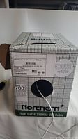 Partial box of Northern White Cat5e CMR cable with label