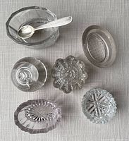 Top down view of salt cellars showing base patterns and interior details.