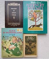 Top view of all five books showing their covers: Treasury of Aesop's Fables, Mother Goose Nursery Rhymes, Alice in Wonderland, The Wind in the Willows, Peter Pan.
