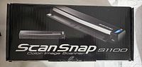Box of Fujitsu ScanSnap S1100 Color Image Scanner showing front graphics and model.