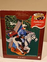 Box displaying the Heirloom Collection Lone Ranger ornament with authentic voice feature, showing the Lone Ranger riding horse Silver on a star background.