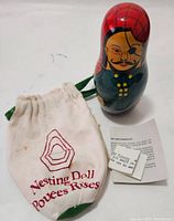 Photo of largest pirate nesting doll with cloth drawstring bag and instruction notes