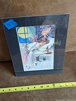 Frontal photo of the vintage Halloween poster showing child, owl, and full text and image.